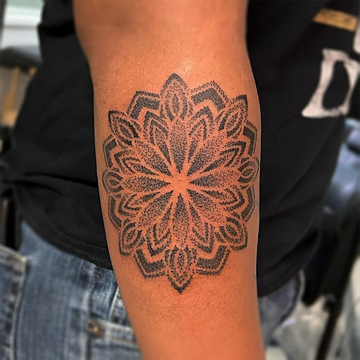 Explore spine tattoo ideas for men, creative tattoo ideas in Brighton, available at Inkwell Tattoos