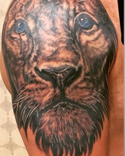 Explore finger hand tattoo ideas, creative tattoo ideas in Charlotte, available at Canvas Tattoo & Art Gallery