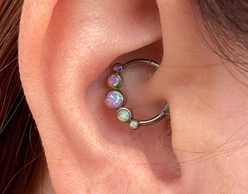 Explore manifestation tattoo ideas, creative tattoo ideas in Dover, available at Agap Body Piercings