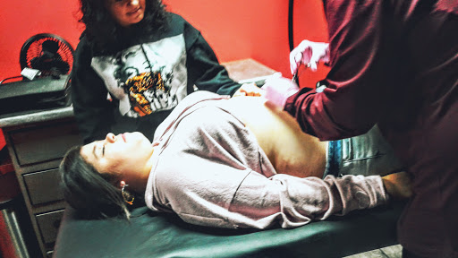 Explore tattoo ideas for men with daughters, creative tattoo ideas in Gadsden, available at Old School Ink Electric Tattooing