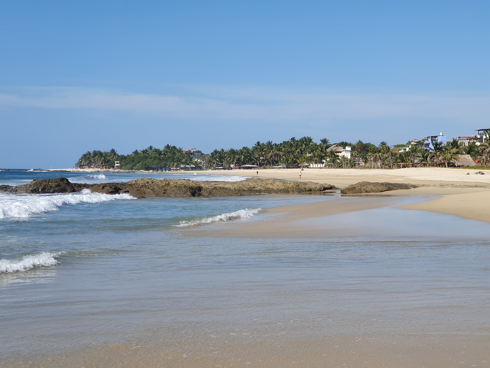 Foto di Playa Agua Blanca con costa lunga e dritta