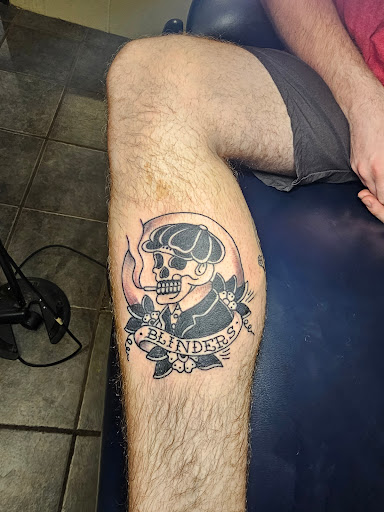 Find flower thigh tattoo ideas for your next unique tattoo in Hot Springs National Park at UnderGroundInk