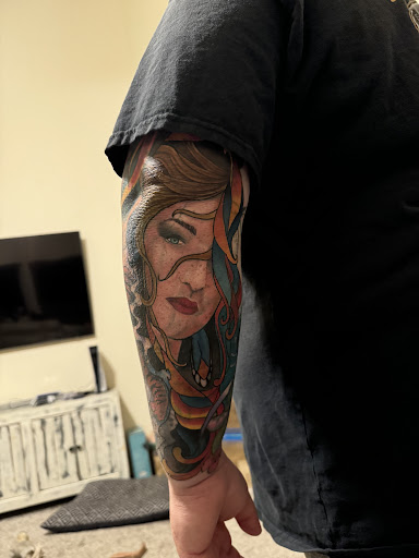 Explore mechanical sleeve tattoo ideas, creative tattoo ideas in Ocoee, available at Slaughterized Ink Tattoo and Piercing Studio