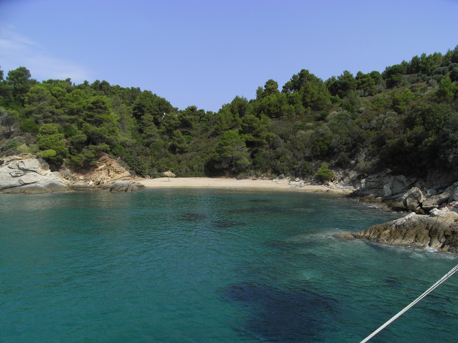 Φωτογραφία του Skiathos beach II με μπεζ άμμος επιφάνεια