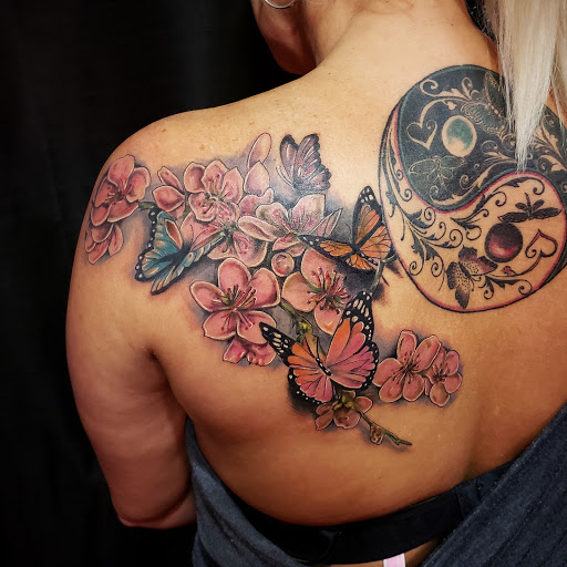 Explore book tattoo ideas for females, creative tattoo ideas in Debary, available at Divine Line Tattoos