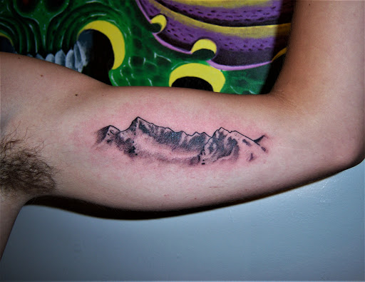 Explore male side tattoo ideas, creative tattoo ideas in Hebron, available at Explosive Ink Tattoo