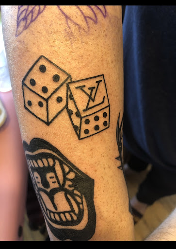 Explore lower tummy tattoo ideas, creative tattoo ideas in Brandon, available at Forever Yours Tattoo and Piercing