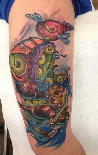Explore dinosaur tattoo ideas for son, creative tattoo ideas in Minot, available at 2D INK