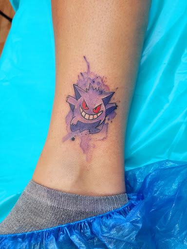 Explore 80's tattoo ideas, creative tattoo ideas in Benton, available at Spectrum Tattoo