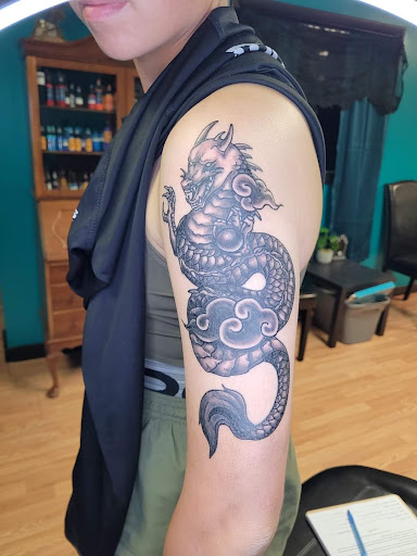 Explore collarbone tattoo ideas for men, creative tattoo ideas in Syracuse, available at Goblins Den Tattoo