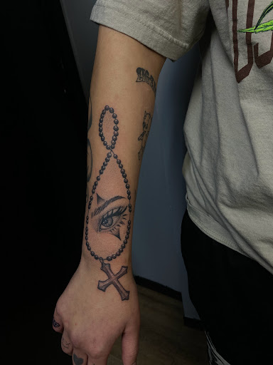 Explore skiing tattoo ideas, creative tattoo ideas in Idaho Falls, available at Sinner Tattoo Studio