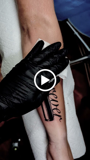 Explore fine line hand tattoo ideas, creative tattoo ideas in Longwood, available at Trinity Tattoo Co Inc