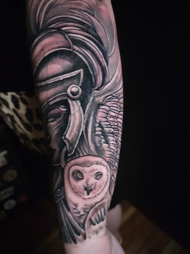 Explore dog bone tattoo ideas, creative tattoo ideas in Clarksville, available at Love Blood Ink Tattoo