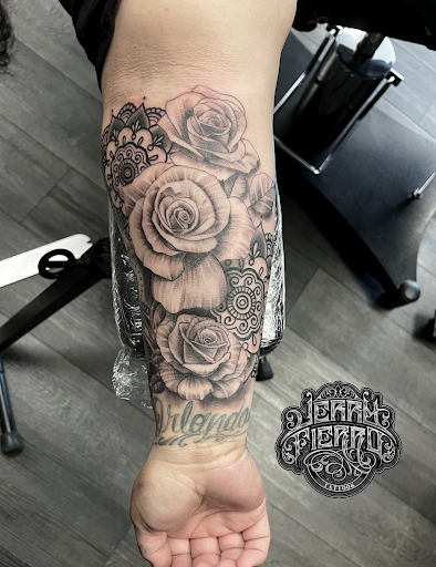 Explore back flower tattoo ideas, creative tattoo ideas in Silver City, available at Independent Ink Tattoo