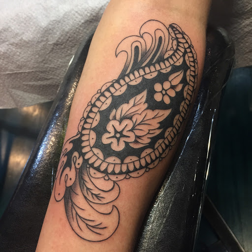 Explore beehive tattoo ideas, creative tattoo ideas in Reno, available at Aces Tattoo