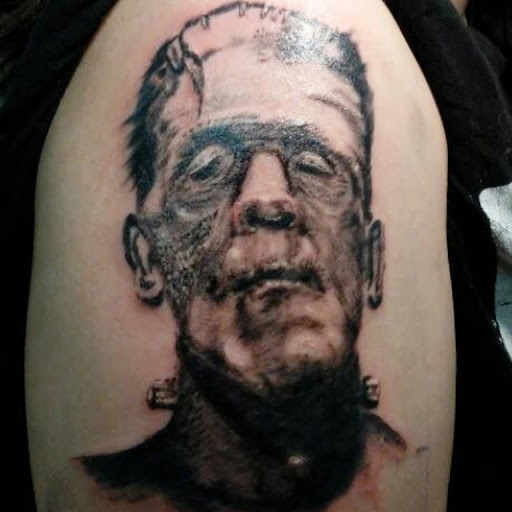 Explore arm tattoo cover up ideas, creative tattoo ideas in Lockport, available at Famous Tattoos by Pinhead