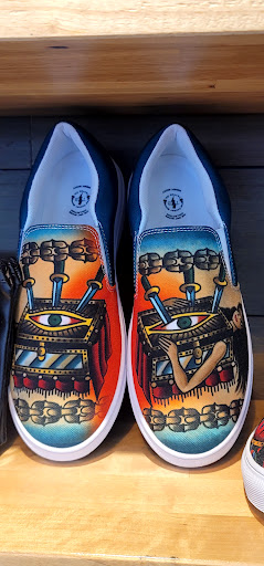 Explore slash tattoo ideas, creative tattoo ideas in Lees Summit, available at The Cherry Bomb Tattoo Co.