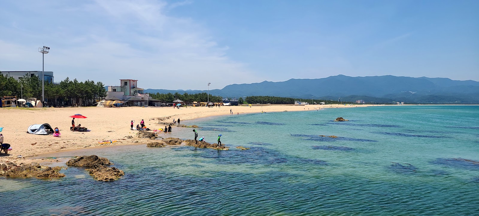 Tokcheon Beach的照片 带有明亮的沙子表面
