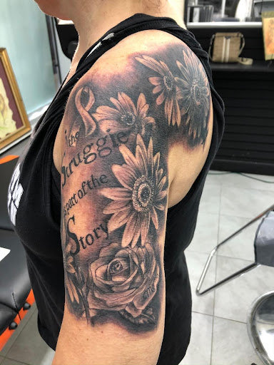 Explore cover up tattoo ideas for shoulder, creative tattoo ideas in Daytona Beach, available at Studio 21 Tattoo & Piercings Daytona Beach