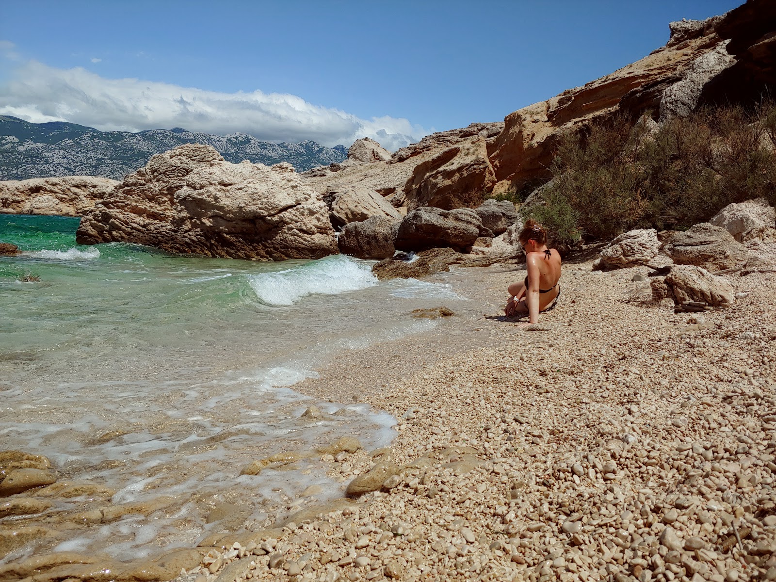 Foto von Streto beach mit türkisfarbenes wasser Oberfläche
