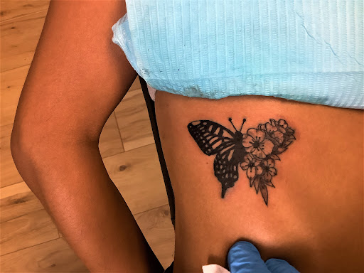 Explore tomahawk tattoo ideas, creative tattoo ideas in Whitehall, available at Beachside Tattoos & Smoke Shop