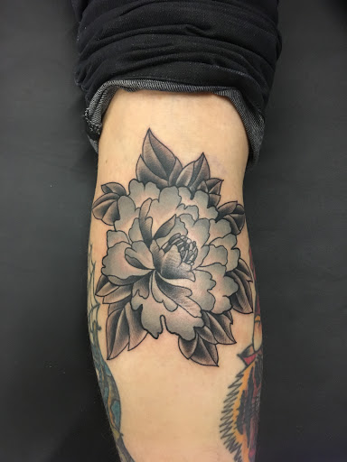 Explore rasta tattoo ideas, creative tattoo ideas in Erie, available at Wayward Tattoo Studio