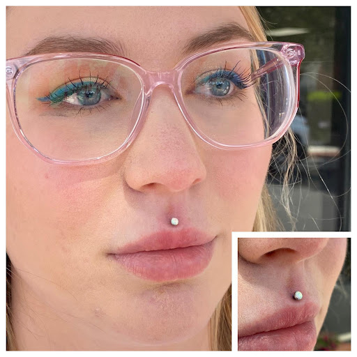 Explore dogwood tattoo ideas, creative tattoo ideas in Dover, available at Agap Body Piercings