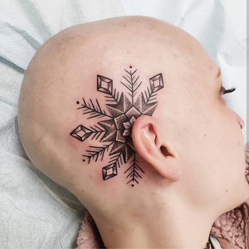 Explore feminine cross tattoo ideas, creative tattoo ideas in Keene, available at Art For Life Tattoos