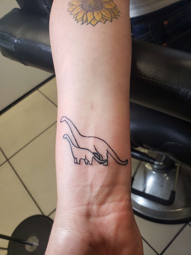 Explore cat tattoo ideas for guys, creative tattoo ideas in Hudson, available at Inkredible Inc Tattoos