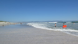 Foto di Grotto beach e l'insediamento