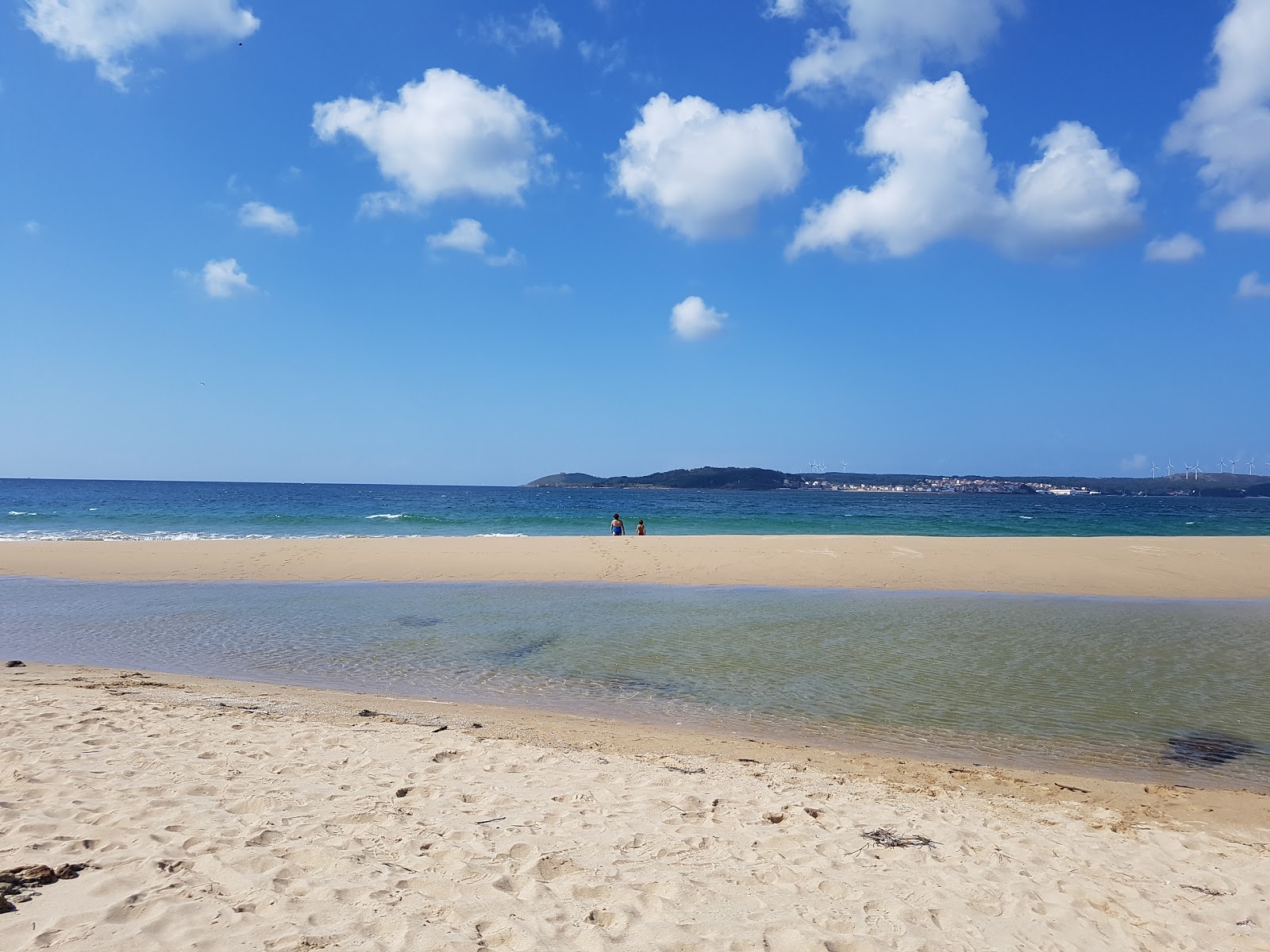 Praia do Lago的照片 带有蓝色纯水表面