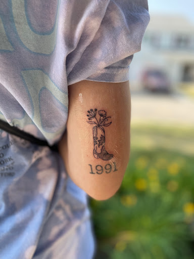 Find bee tattoo ideas for your next unique tattoo in North Aurora at Ink Bar Tattoo