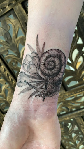 Find tattoo sleeve cover up ideas for your next unique tattoo in Tecumseh at Lucid Tattoo Gallery