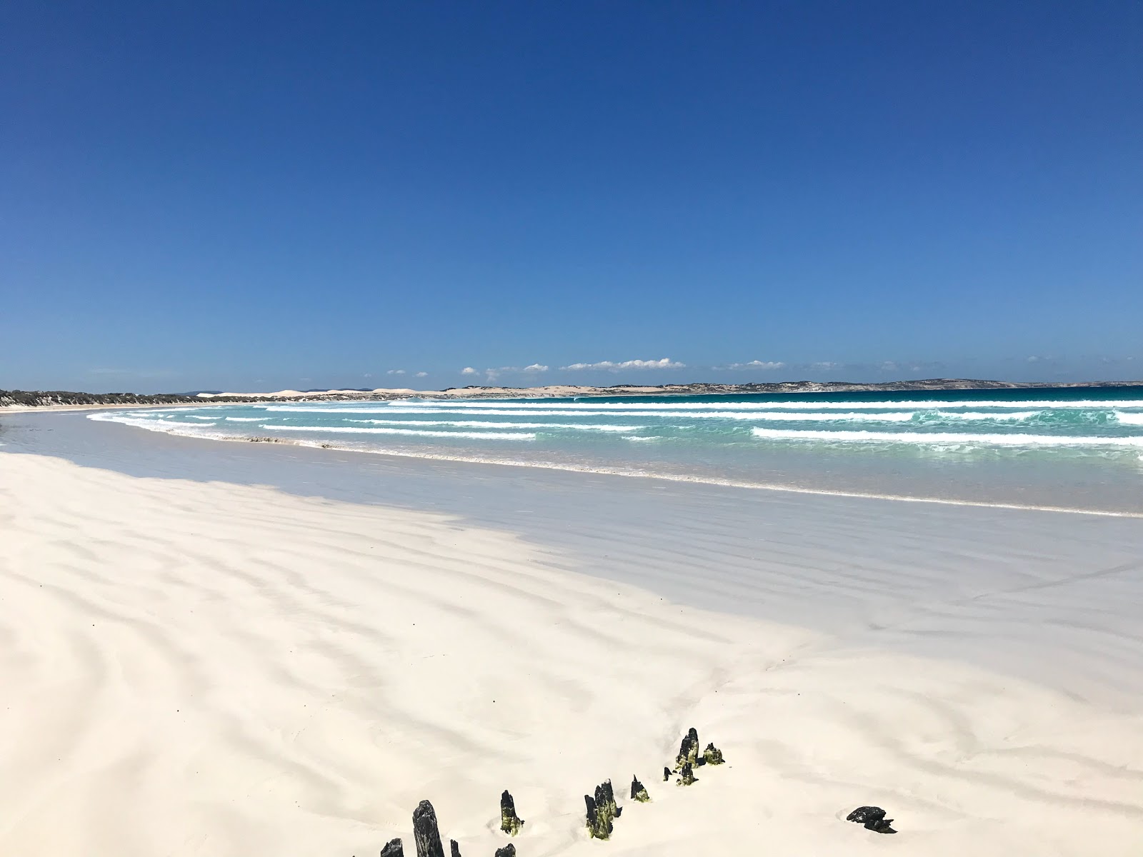 Foto de Sensation Beach com areia fina branca superfície