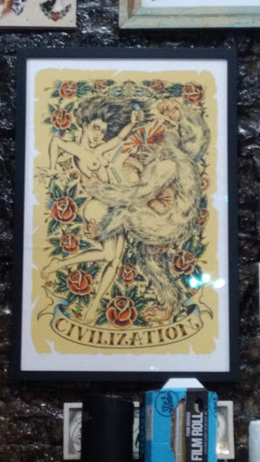 Explore rock tattoo ideas, creative tattoo ideas in New Orleans, available at Downtown Tattoos and Piercing