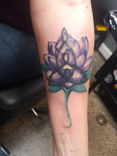 Explore tattoo ideas for mens thigh, creative tattoo ideas in Raleigh, available at Mad Ethels Tattoo & Body Piercing