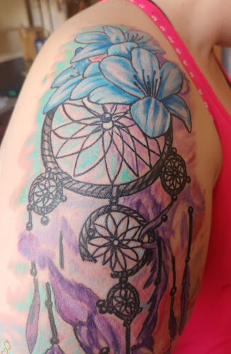 Explore blue rose tattoo ideas, creative tattoo ideas in Omaha, available at A New Creation Tattoo