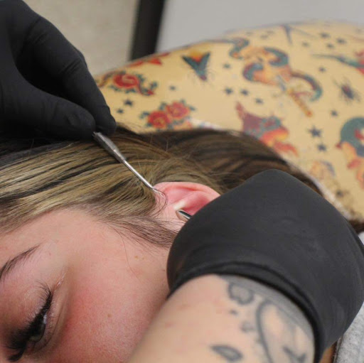 Explore cool upper arm tattoo ideas, creative tattoo ideas in Kingsport, available at Ink-a-zoid Tattoos & Piercings