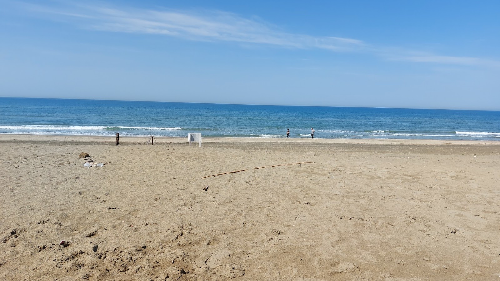 Accesso Spiaggia Pappin的照片 带有蓝色的水表面