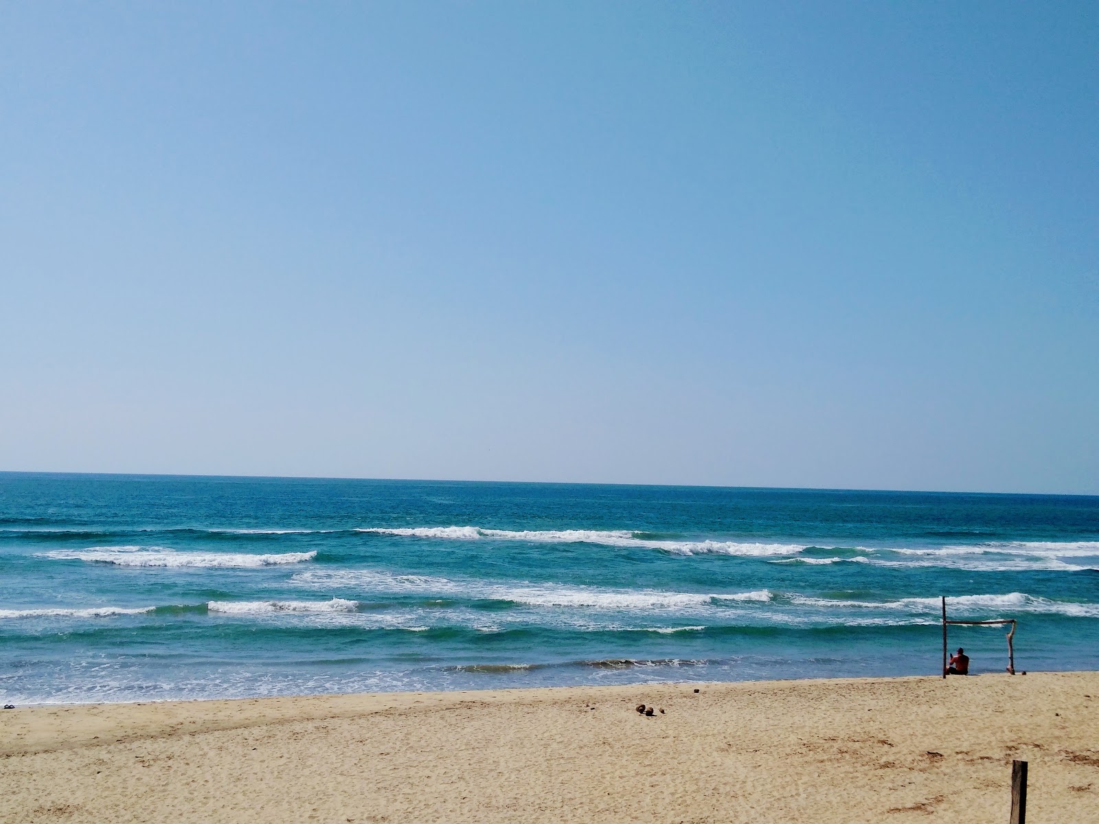 Photo de Playa pico del Monte II avec sable lumineux de surface