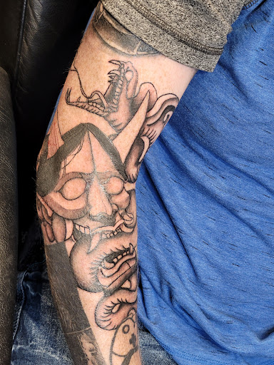 Explore scissor tattoo ideas, creative tattoo ideas in Maryville, available at Distinked Tattoo