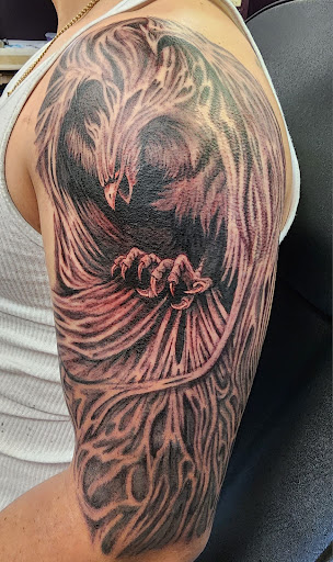 Explore tattoo ideas for shoulder cap, creative tattoo ideas in Independence, available at Odins Mark Tattoo and Emporium