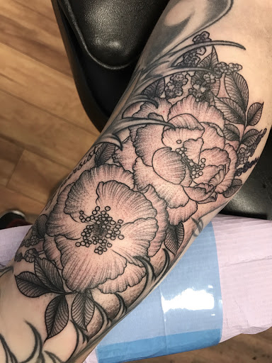 Explore tramp stamp tattoo cover up ideas, creative tattoo ideas in Pittsburgh, available at Pittsburgh Tattoo Company