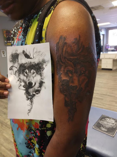 Explore wrist wrap tattoo ideas, creative tattoo ideas in Warren, available at Fat Cats Tattoos