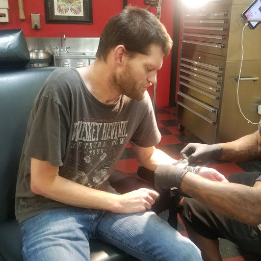 Explore number 2 tattoo ideas, creative tattoo ideas in Little Rock, available at Psycho Delic Butterfly Tattoos