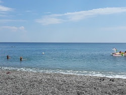 Locri Beach'in fotoğrafı düz ve uzun ile birlikte