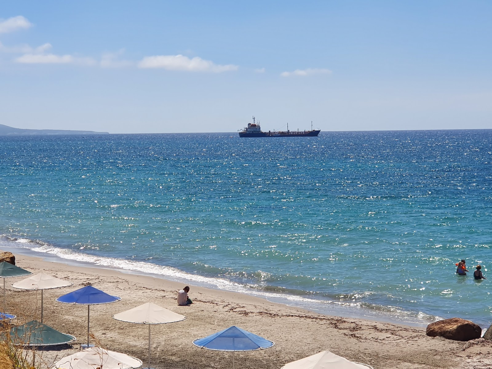 Kouros Palace beach'in fotoğrafı doğal alan içinde bulunmaktadır