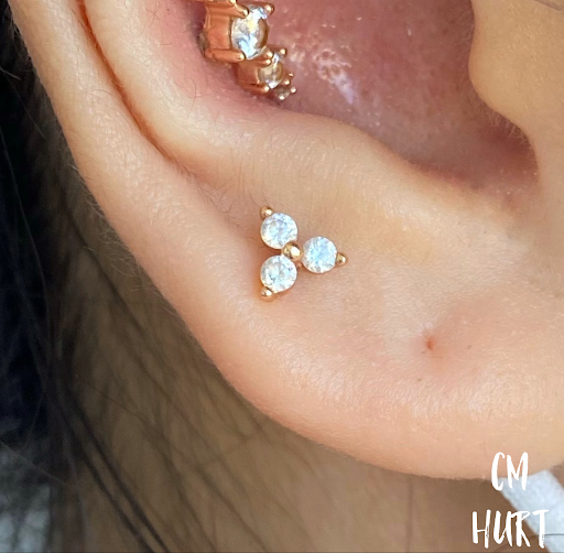 Explore dog tattoo ideas for females, creative tattoo ideas in Garden Grove, available at CM Hurt Piercing & Jewelry