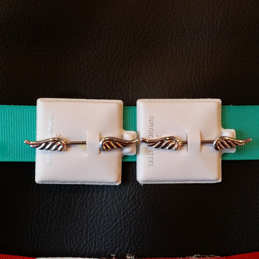 Explore women's leg tattoo ideas, creative tattoo ideas in Cincinnati, available at Twisted Nails, Piercings & Tattoos