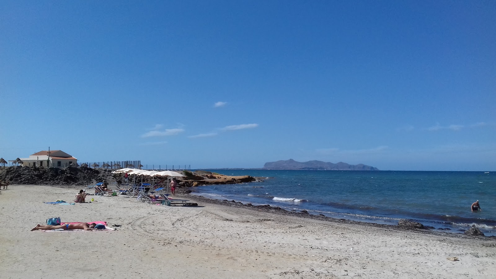 Photo de Spiaggia San Teodoro avec un niveau de propreté de sale